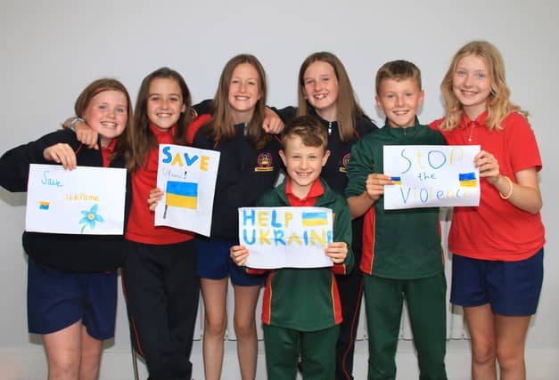 Caoimhe Hartney, Kate Cronin, Rachel Maher, Caoimhe O'Farrell, Harry O'Sullivan, James Maher and Louise O'Sullivan (missing from photo Madison Rountree) with their Bracelets | PICTURES: Adrian Butler