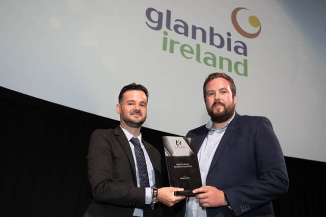 Rafael Bernardes, Quality and Continuous Improvement (Innovation) Manager at Dublin Bus presents the Grand Prix award to Ed Elder, outgoing Head of Health & Safety at Glanbia Ireland.