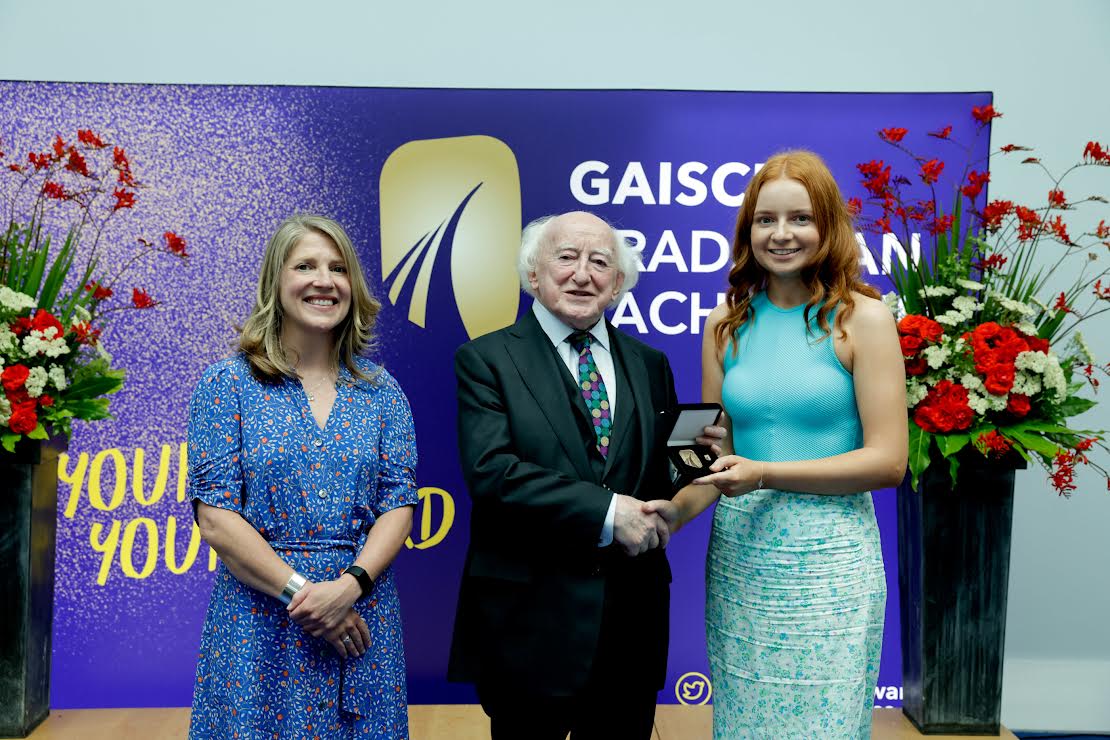 Ciara McDaid, right, with President of Ireland Michael D. Higgins and Yvonne McKenna, CEO of Gaisce