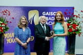 Ciara McDaid, right, with President of Ireland Michael D. Higgins and Yvonne McKenna, CEO of Gaisce