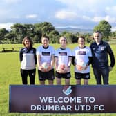 Drumbar United's senior ladies team manager, senior ladies players Aisling Barron, Dahanna Feeney, Ava Duncan, Mollie Costello with club chairman, Kevin Martin