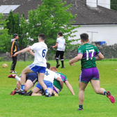 Colm Moreton is taken down by the St Mary's defence at the expense of a penalty Picture: Willie Donnellan