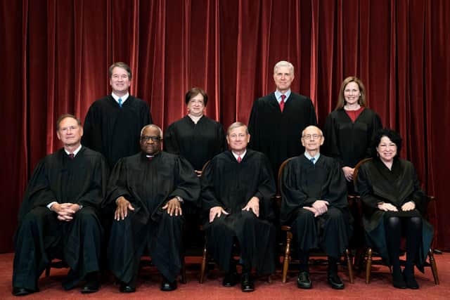 Justice Clarence Thomas wrote for the majority that the constitution protects “an individual’s right to carry a handgun for self-defence outside the home”.