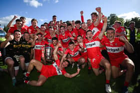 Derry players celebrate with the Anglo Celt Cup after the Ulster GAA Football Senior Championship Final between Derry and Donegal at St Tiernach's Park in Clones, Monaghan. Photo by Stephen McCarthy/S