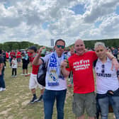 Declan Gallagher from Galliagh - who is a member of the Derry branch of the Liverpool Supporters Club - is flanked by two Real Madrid fans before last Saturday's European Cup final in Paris