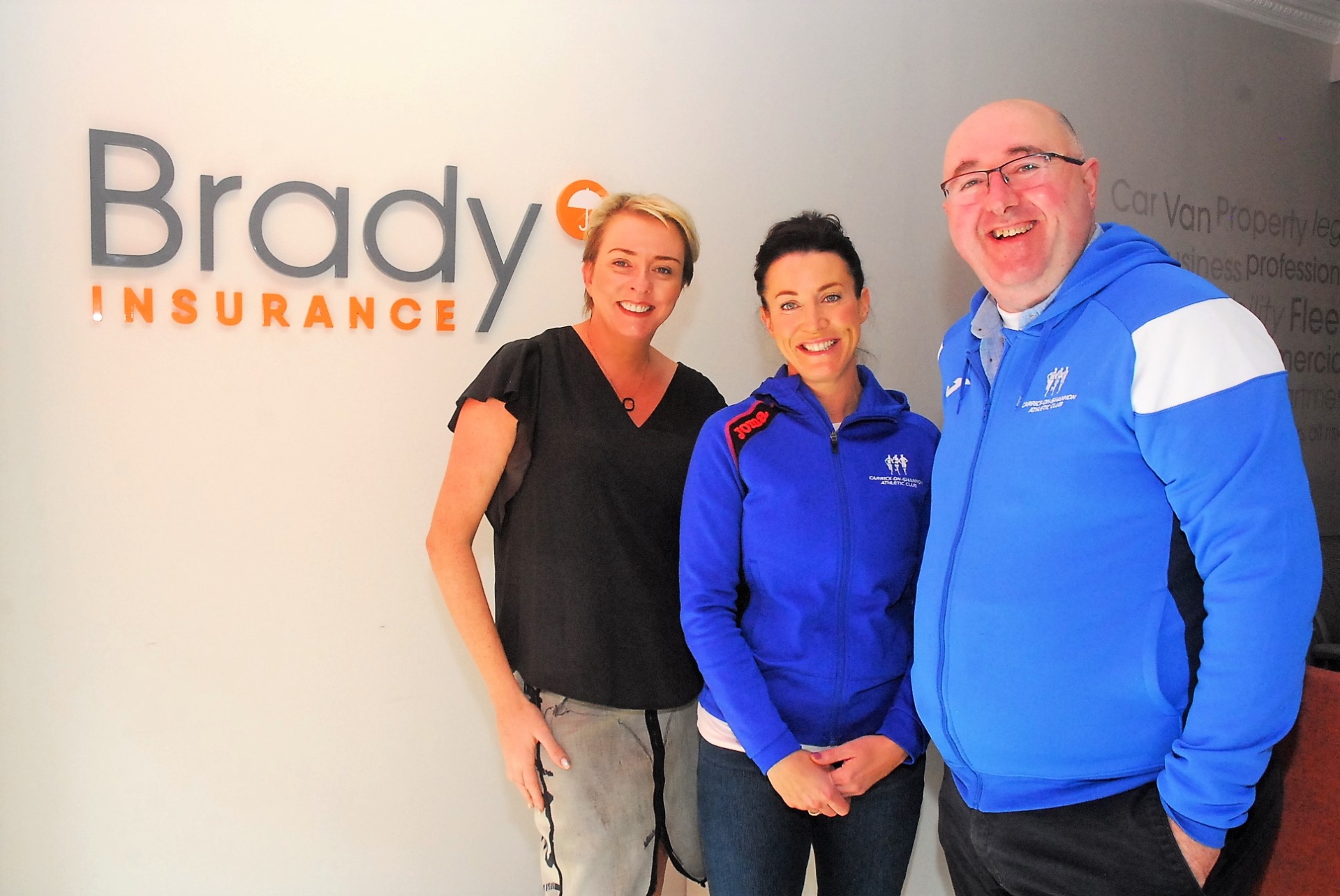 Jane Brady, Managing Director of Brady Insurance, pictured with Carrick-on-Shannon AC Chairperson Siobhan Murtagh and Secretary John Connolly Picture: Willie Donnellan