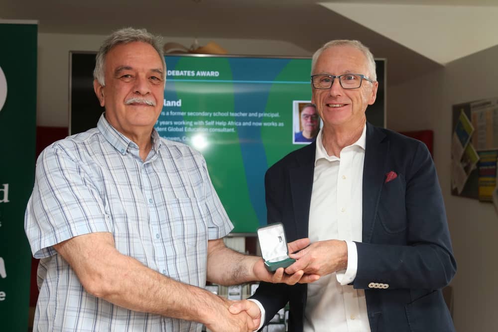 Inishowen teacher Patsy Toland receiving his award