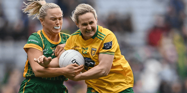 Karen Guthrie of Donegal is tackled by Vikki Wall of Meath. Photo: Sportsfile