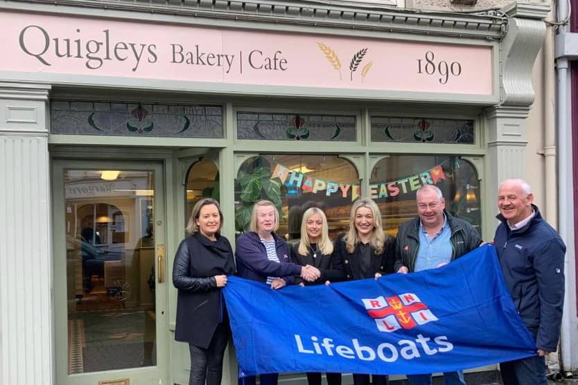 RNLI lifeboat fundraising committee at the launch with sponsors Gillian O'Connor and Niamh O'Connor, Quigleys Bakery