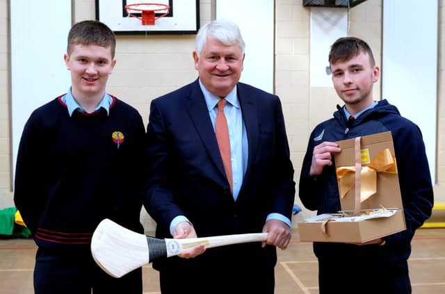 Conor Duggan and Oran Byrne make a presentation to Denis