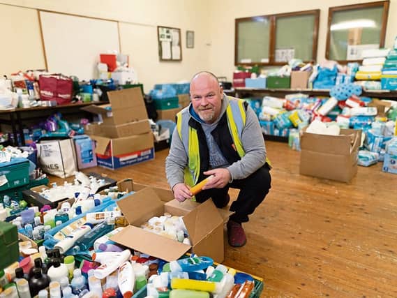 Wayne Lynch pictured sorting supplies for the Ukrainan refugees in Ardagh | PICTURES: Marie Keating