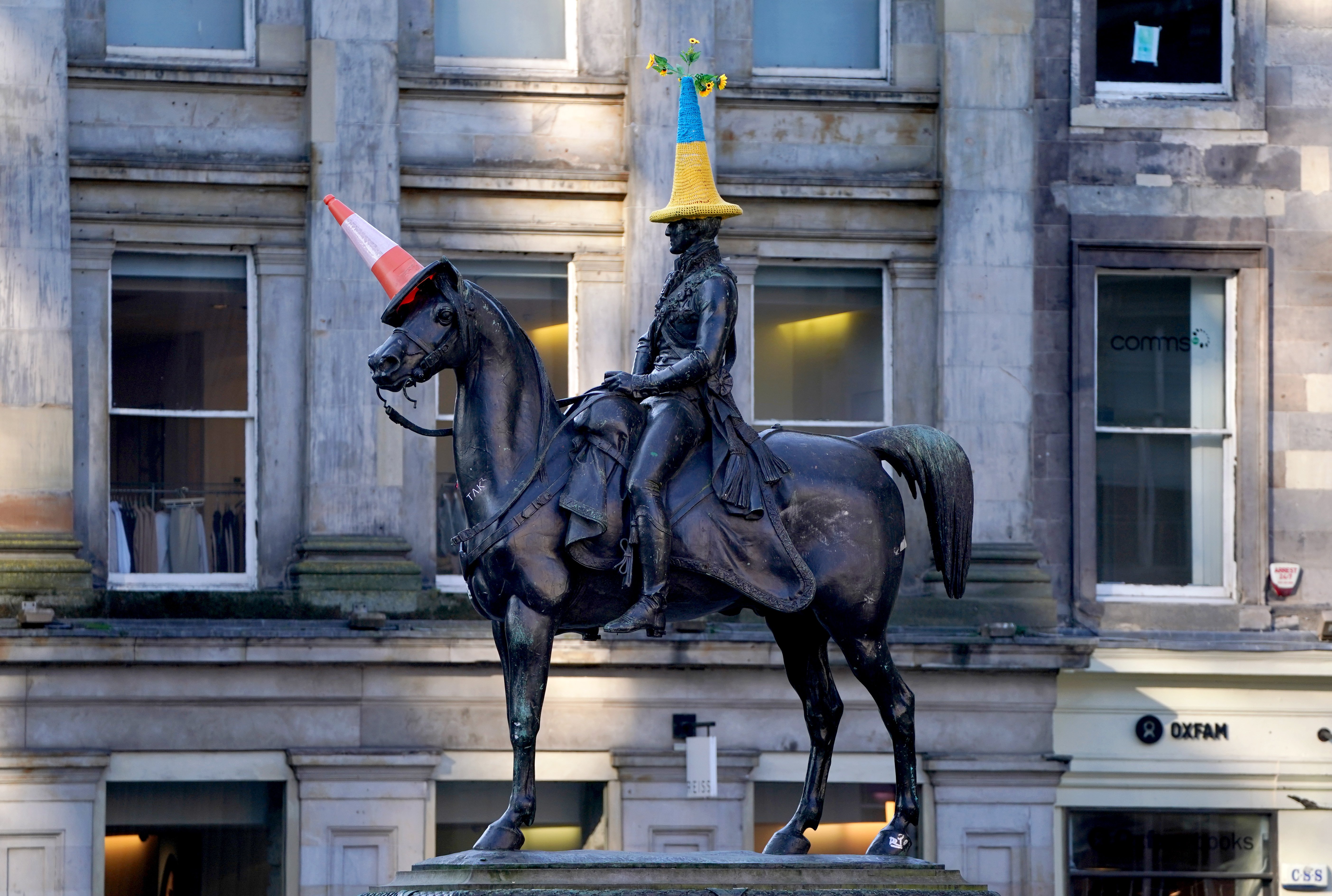 Glasgow statue famous for traffic cone ‘hat’ gets makeover for Ukraine