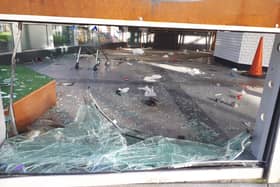 A shopping trolley appears to have been hurled through the window at the old tourist office in Arthur's Quay