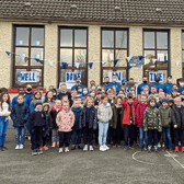 Three cheers: The victorious Caherline team got a heroes’ welcome on a visit to Caherconlish NS