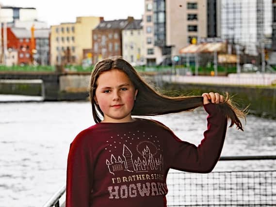 Before: Freya Griffin shows off her long brown hair, ahead of this Tuesday, when she had it chopped off for charity, below | MAIN PICTURE: Brendan Gleeson