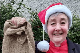 Rev Fran Grasham has hung up a sandbag Christmas stocking to focus on the hunger crisis in South Sudan
