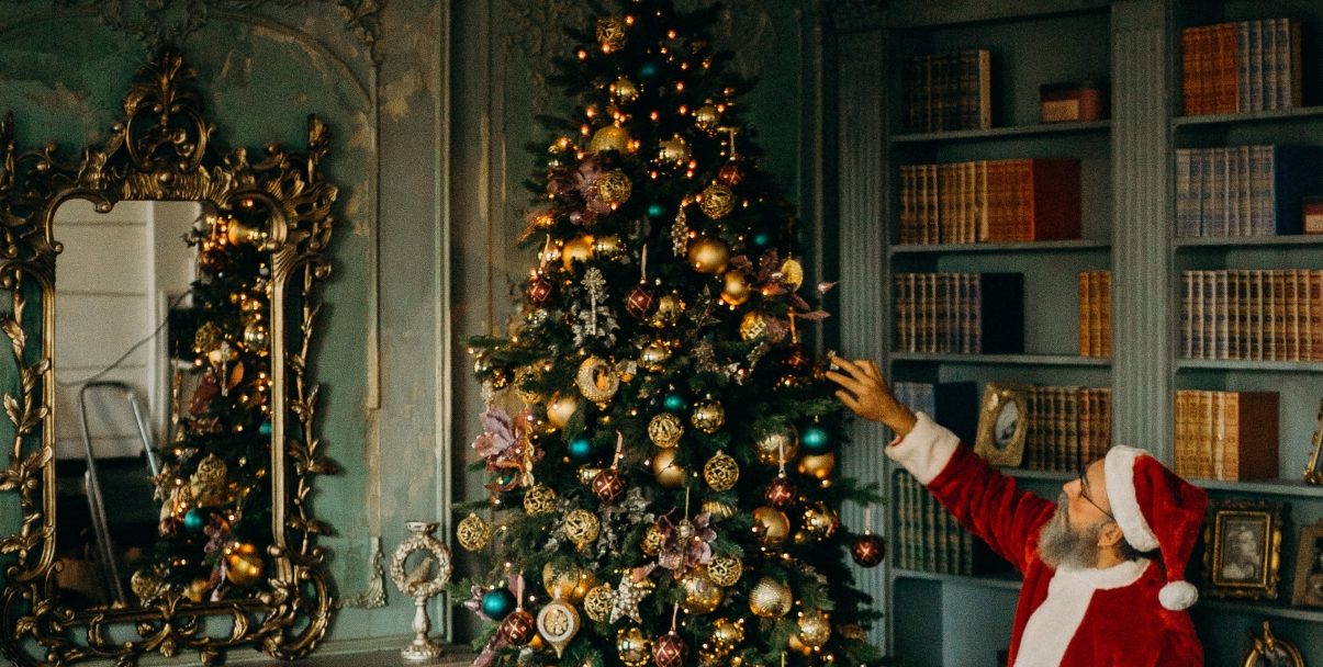 Placing your  tree someplace where it isn't facing direct heat will help it not to dry out too fast