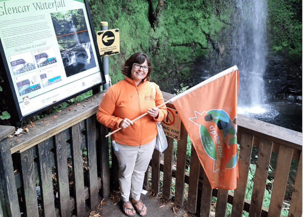 Pictured flying the flag for Jack & Jill at the Glencar Waterfall in Co Leitrim is Erin Watt Shepherd, Specialist Children’s Liaison Nurse with the Jack & Jill Children’s Foundation.