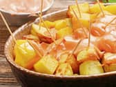 The word "tapas" is derived from the Spanish verb tapar, "to cover"