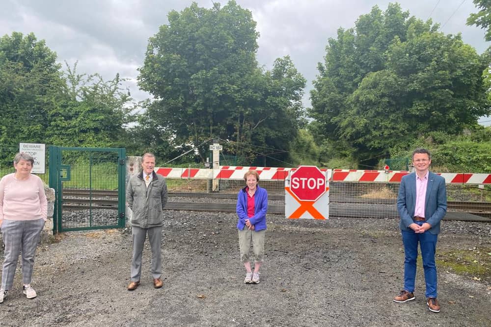 Betty Houlihan , Cllr Gerald Mitchell and Maureen Drake with Minister-of-State Patrick O’Donovan at the Fantstown level crossing near Kilmallock