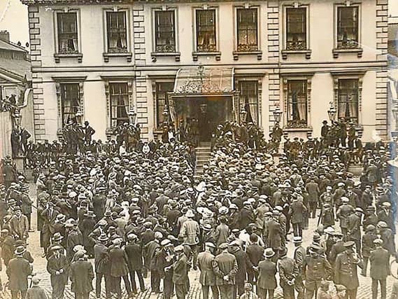 Crowds gathered outside Dublin's Mansion House on the day of the truce