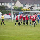 Maiden City celebrate during their quarterfinal victory over Creggan Swifts.
