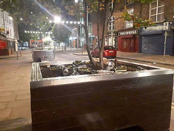 Leftover cans and cups in Cathrine Street last week