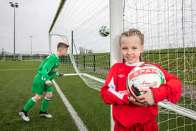 Ben Nolan (10) and Ayla Egan (9) helped launch the SPAR FAI School Zone initiative at the FAI National Training Centre