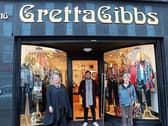 Veronica Coughlan Benn, Paul Fitzgerald and  Lillian  Coughlan Gibbs pictured outside the Gretta Gibbs store ahead of the anniversary  | PICTURE: Richard Lynch/ilovelimerick