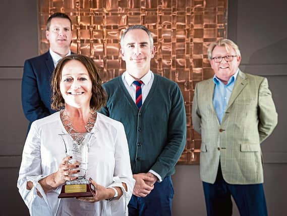 Finola O'Donnell, chairperson of Ingenium TC who accepted the award. Also pictured is Darren Harding, Clayton Hotel; Donn O'Sullivan, Limerick Leader and Dave O'Hora, Southern PICTURE: Keith Wiseman