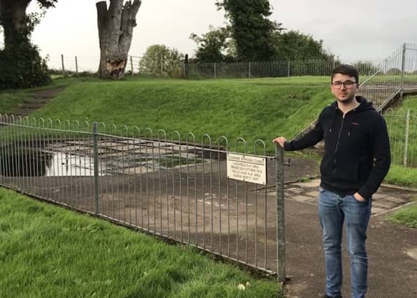 Cllr Sean Bateson outside the play park at Larchfield in Kilrea.