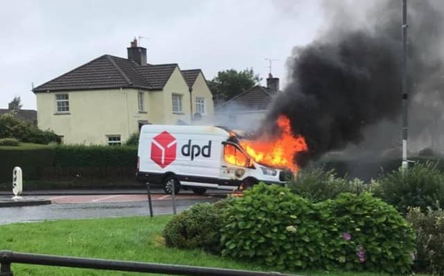One of the vehicles on fire in Creggan.