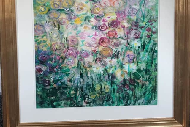 Her art is a stunning mix of mediums and her love and passion for nature and beauty is abundant in her work.