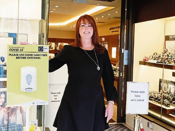Among the many shops which re-opened this week were jeweller Matthew Stephens. Elaine Lyons stood ready to welcome customers back