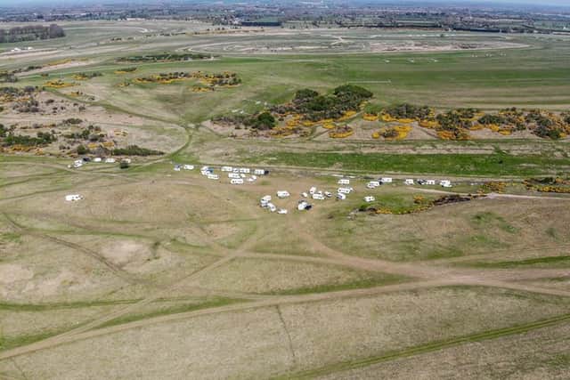 On Monday, drone photographs showed 23 caravans at the main encampment on Walsh's Hill off the R445 (below).
