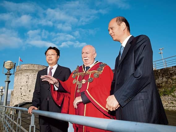 Jim Long, during his 2011 term as mayor with members of a delegation from Nanjing, Yang Weize and Lou Linquan