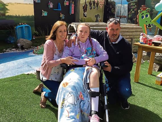 TV Show DIY SOS is appealing to Limerick tradespeople to volunteer their services and build an extension for Amy, pictured with parents Sharon and Mark