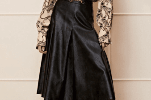 Let this number take you from work to night. Add a pair of heels and you are ready to paint the town red.