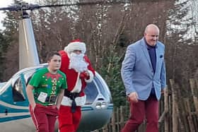 Tiglin Chair, Santa and the Elf arriving at Tiglin before Santa made his epic worldwide tour this week