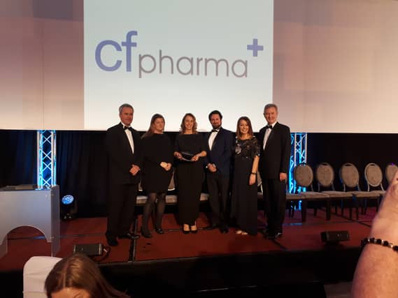 Cathal Smyth of sponsors State Street presents award to CF Pharma