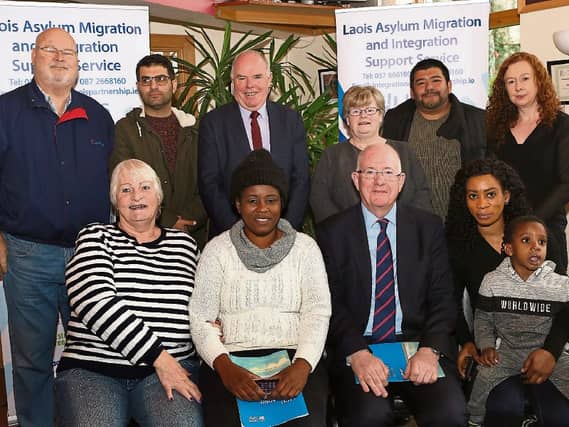 Strategy launch Cllr John Joe Fennelly and representatives from Abbeyleix Community and Direct Provision Centre with Minister for Justice and Equality Charile Flanagan Picture: Michael Scully
