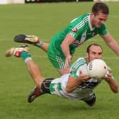 Moorefield's Kevin Murnaghan under considerable pressure from Con Kavangh of Sarsfields  in the opening round of this year's SFC   Photo Pat Tinsley