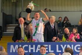 Michael Lyng & the Kilkenny GAA Chairman Jimmy Walsh with Shane Walsh lifting the Cup following Tullaroan’s victory over Thomastown in the Michael Lyng Motors Hyundai Intermediate Final