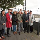 Family members of the deceased men and public representatives at the plaque in honour of Bryan Whelan and TJ O'Herlihy PICTURE: Brendan Gleeson