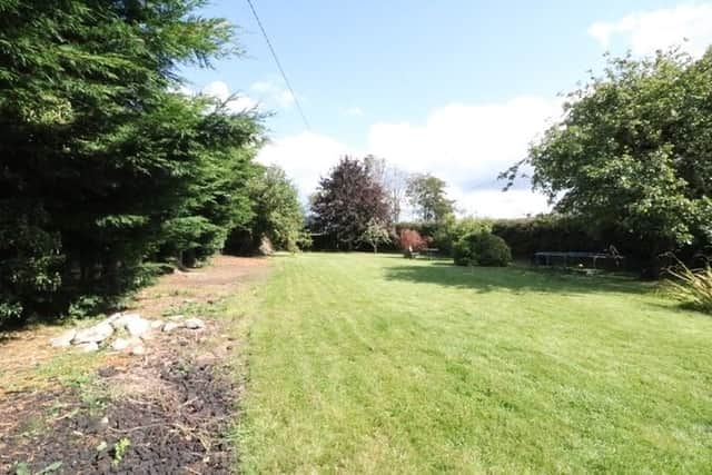 Outside the property sits on c. 1/3 of an acre with a large private rear garden with mature hedging, trees and shrubs, detached shed, offers ample parking and overlooks exceptional country views. Bramley Cottage is situated in the quiet rural setting of Martinstown and it is within easy reach of the surrounding towns of Newbridge, Kicullen, and Kildare Town.