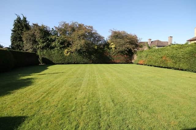 Built in the early 1950's the property benefits from oil fired central heating, PVC fascias/soffits and mostly aluminium single glazed windows. The bungalow sits on c. 1/3 Acre site and it is approached by a gravel drive with a large south facing rear garden enclosed by trees and hedges offering an oasis in the middle of town.