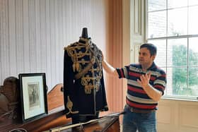 John Power examining one  of the exhibits commemorating lost Irish soldiers in the First World War