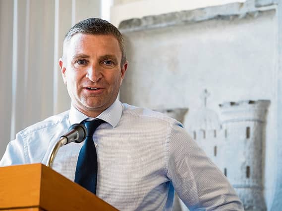 Deputy Niall Collins: the US system whereby you cannot register a car without a valid licence and insurance should pertain here also