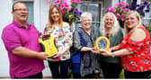 Rebecca Cox, Julie Banim and Amanda Ross from Naas Community First Responders present Mark Hazzard and Catherine O'Sullivan with a defibrillator. Photo Aishling Conwayr
