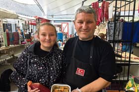 Fenerbahce fans: Sefik Dikyar with his daughter, Leyla, at their busy Milk Market stall